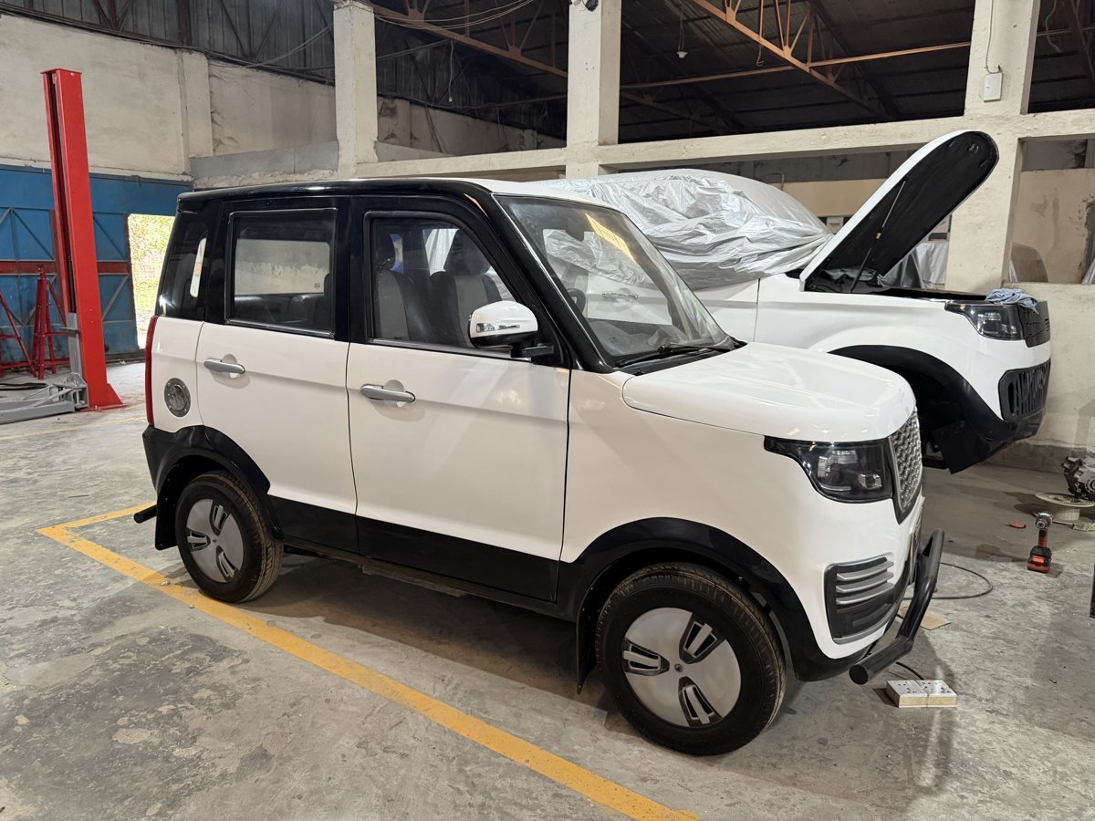 V2 assembly — hood open